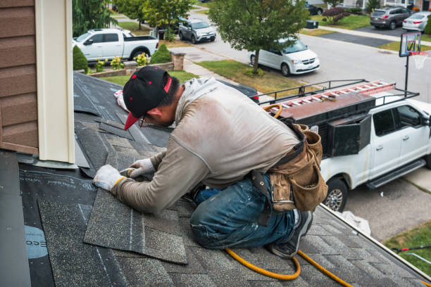Professional Roofing technician working in Tioga, TX
